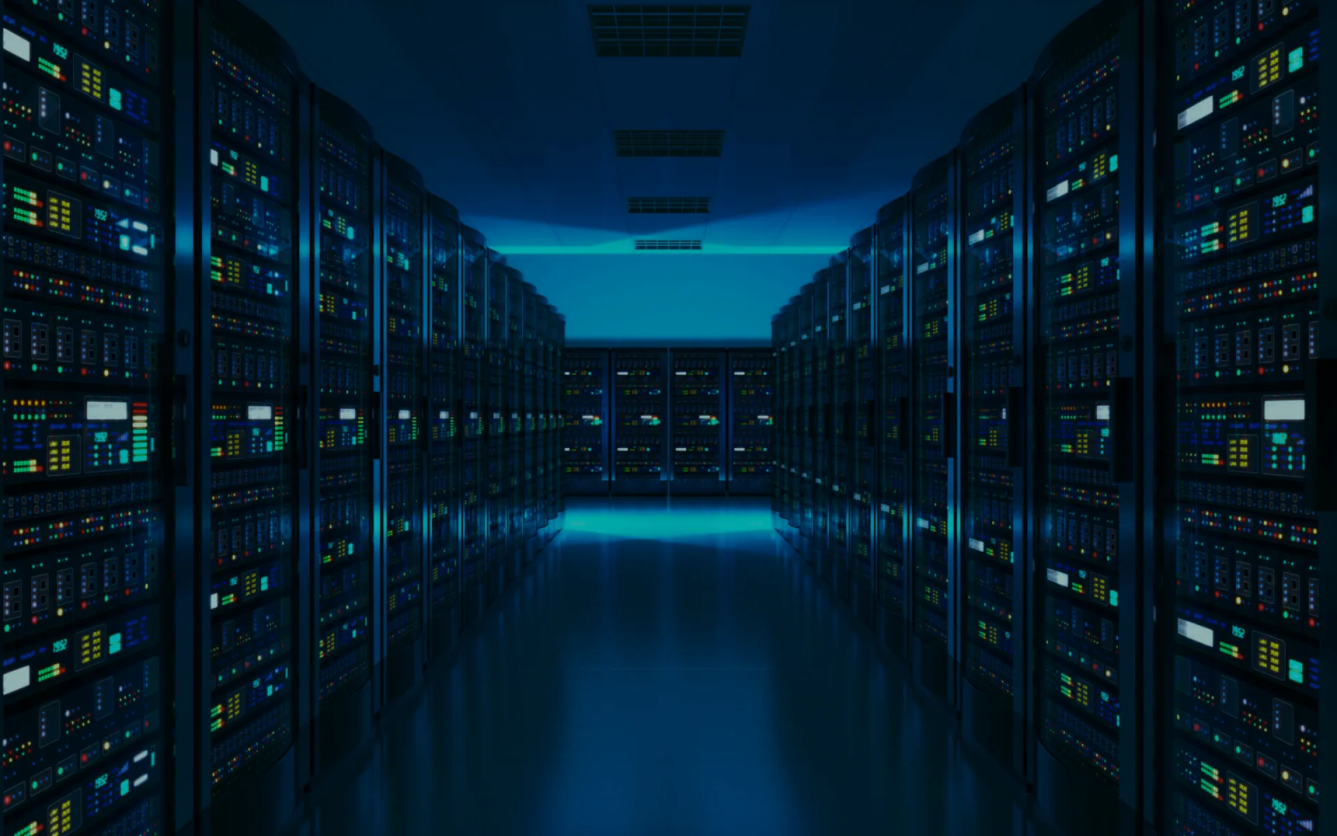 A data centre aisle between rows of server racks.